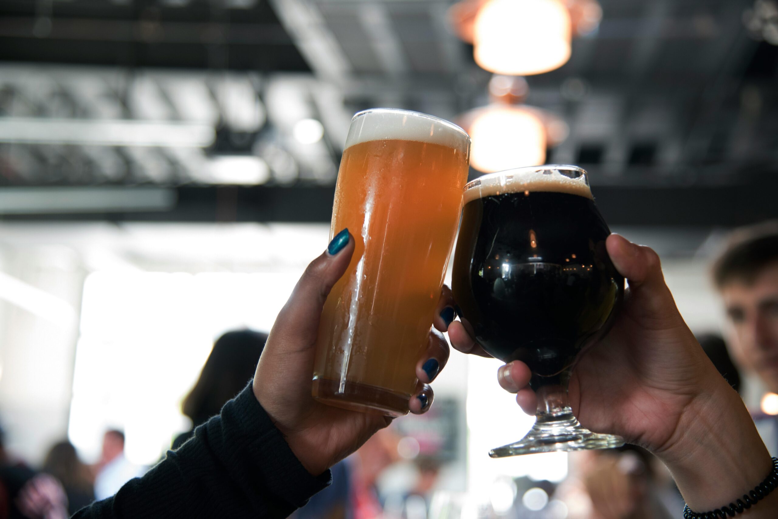 People toasting with beers